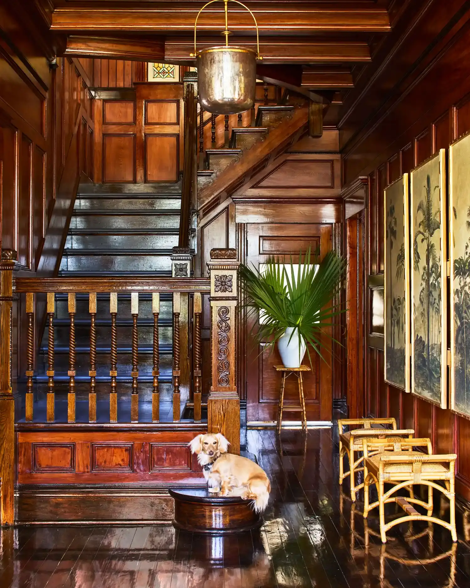 The cypress and heart-pine stair hall.