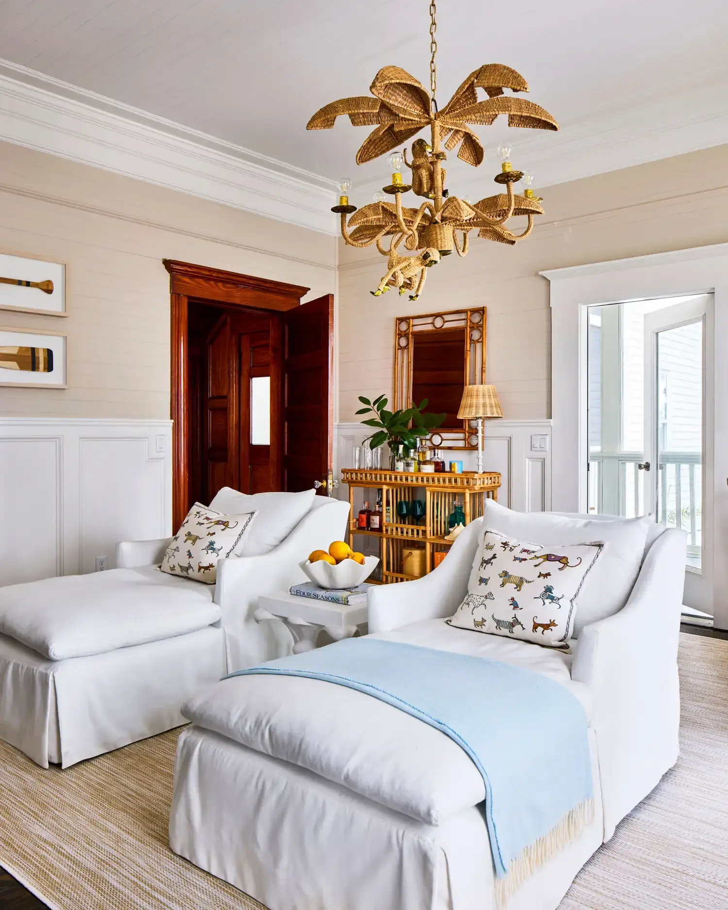 The palm-frond chandelier in the game room.